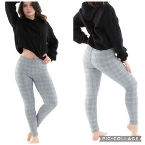 American Eagl size small plaid leggings gray, baby blue & white background​